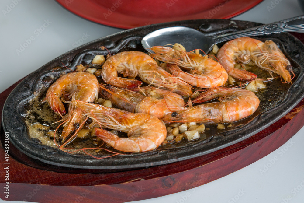 Famous food in the Philippines Butter Garlic Shrimp Sizzling Gambas Famous food in the Philippines Butter Garlic Shrimp Sizzling Gambas