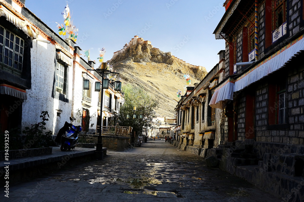 narrow street in the Tibetan city of temples