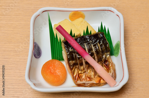 japanese cuisine: Grilled fish with ginger and leaf