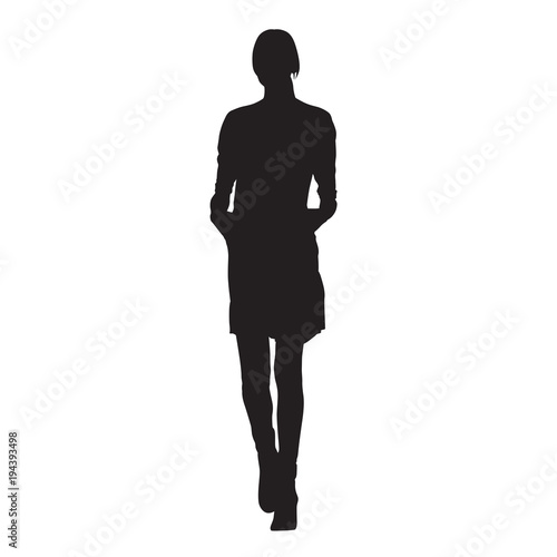 Slim young lady walking in spring coat. Hands in pockets. Isolated vector silhouette