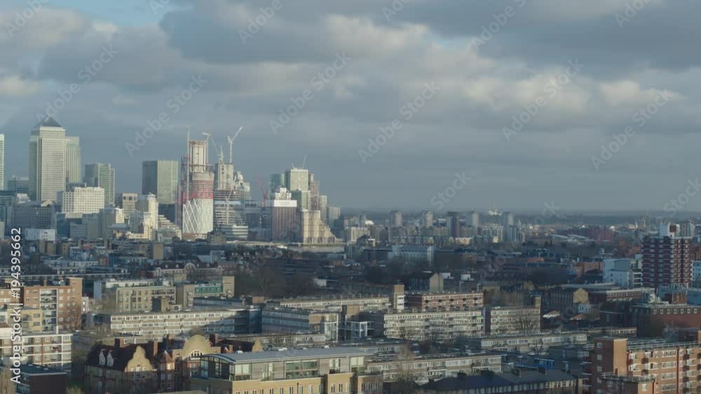 Aerial panoramic shot of iconic skyline of Canary Wharf and River Thames. London, United Kingdom. Aerial panoramic shot of iconic skyline of Canary Wharf and River Thames. London, United Kingdom.