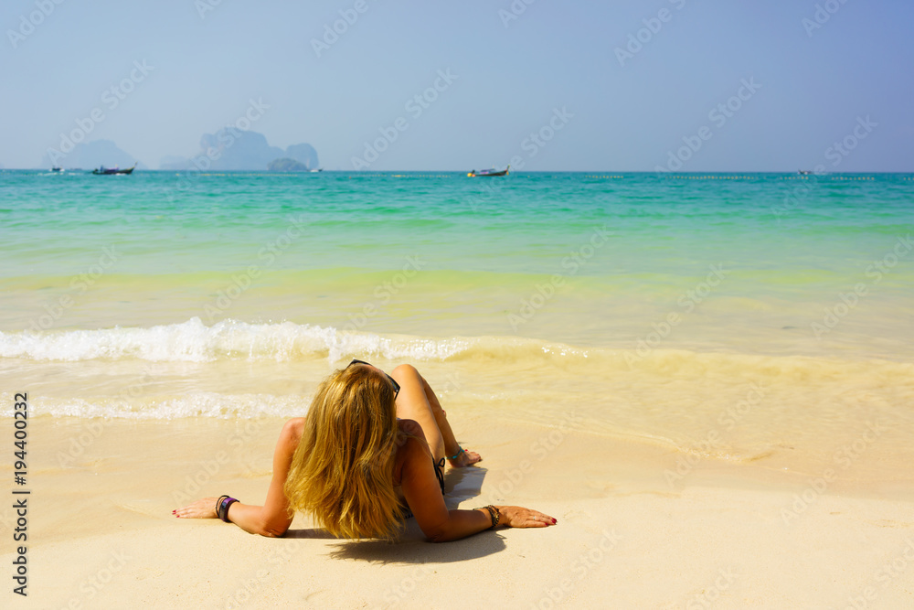 woman resting at the tropical Thailand Railay beach woman resting at the tropical Thailand Railay beach