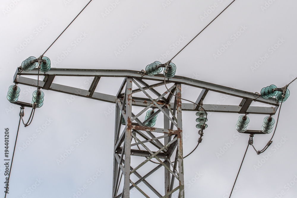 Electric pole with power line. Power pole with external electric separator on top isolated on white background. Concept: electricity and electricity supply Electric pole with power line. Power pole with external electric separator on top isolated on white background. Concept: electricity and electricity supply