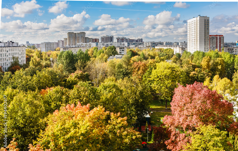 Fototapeta premium City landscape through a window glass. Autumn