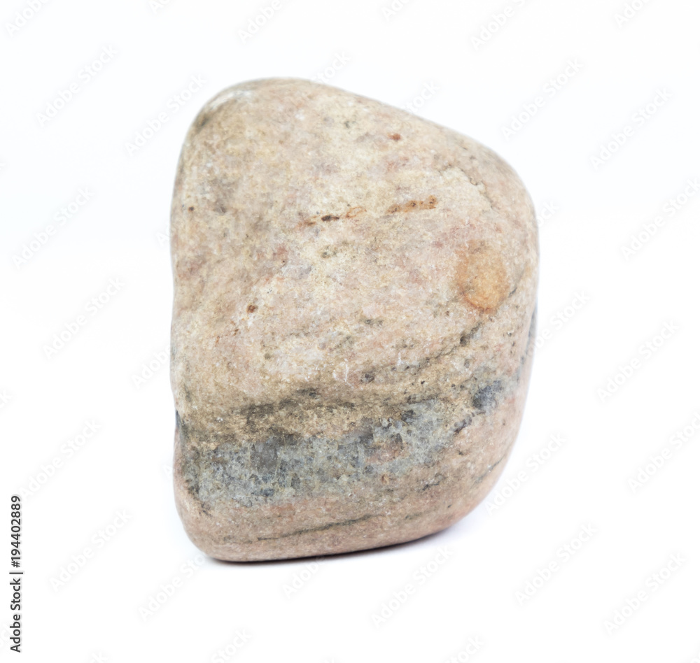 Single natural stone on white background, close-up Single natural stone on white background, close-up
