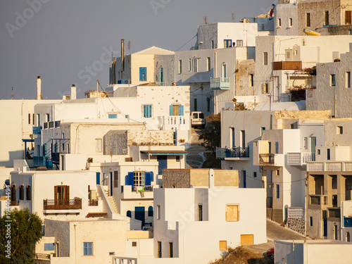 Close up of the white houses of Astypalaia island ,during the golden hour ,sunset photo