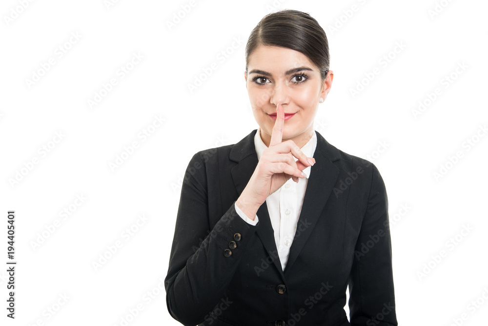 Beautiful female flight attendant showing silent gesture Beautiful female flight attendant showing silent gesture
