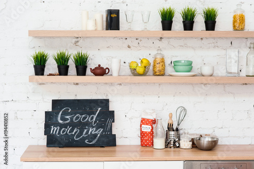 Morning kitchen with plate “Good morning!”.