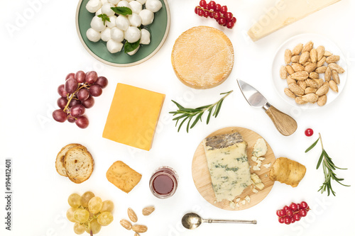 Various types of cheese a white background with copy space