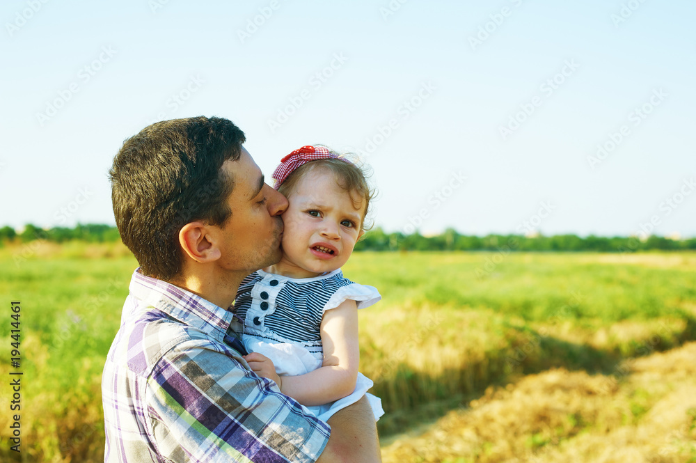 Happy father and daughter on a summer walk Happy father and daughter on a summer walk