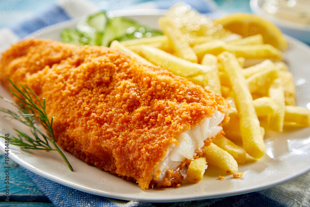 Portion of crispy fish with french fries Stock Photo | Adobe Stock