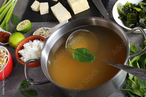 dashi in a stainless casserole, close-up photo