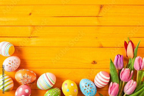 Colorful yellow Easter background with copy space