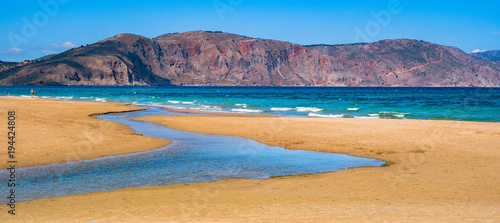 the river flows into the sea. the sea and the mountains. Georgioupolis, Crete, Greece photo