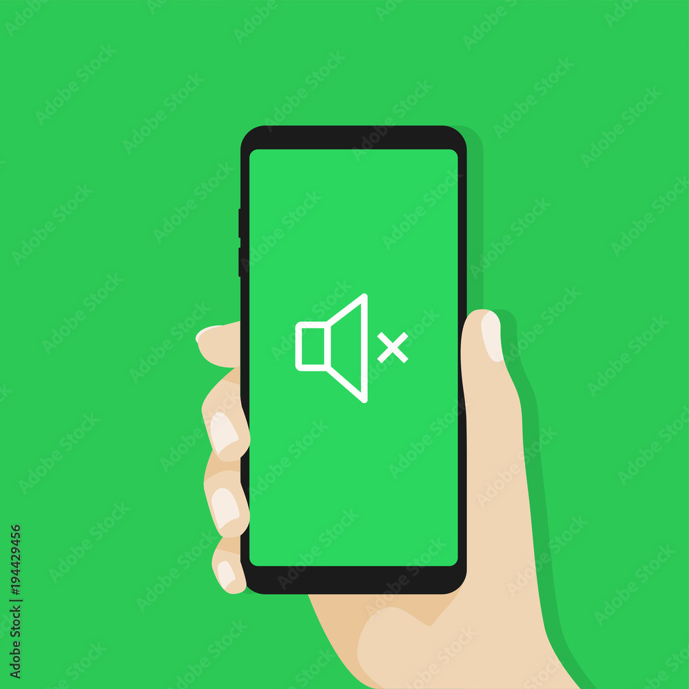 Fotografie Hand holding smartphone sound off.