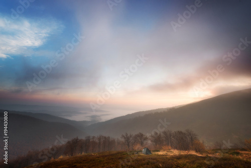 Fototapeta Naklejka Na Ścianę i Meble -  sunrise in the mountains tent