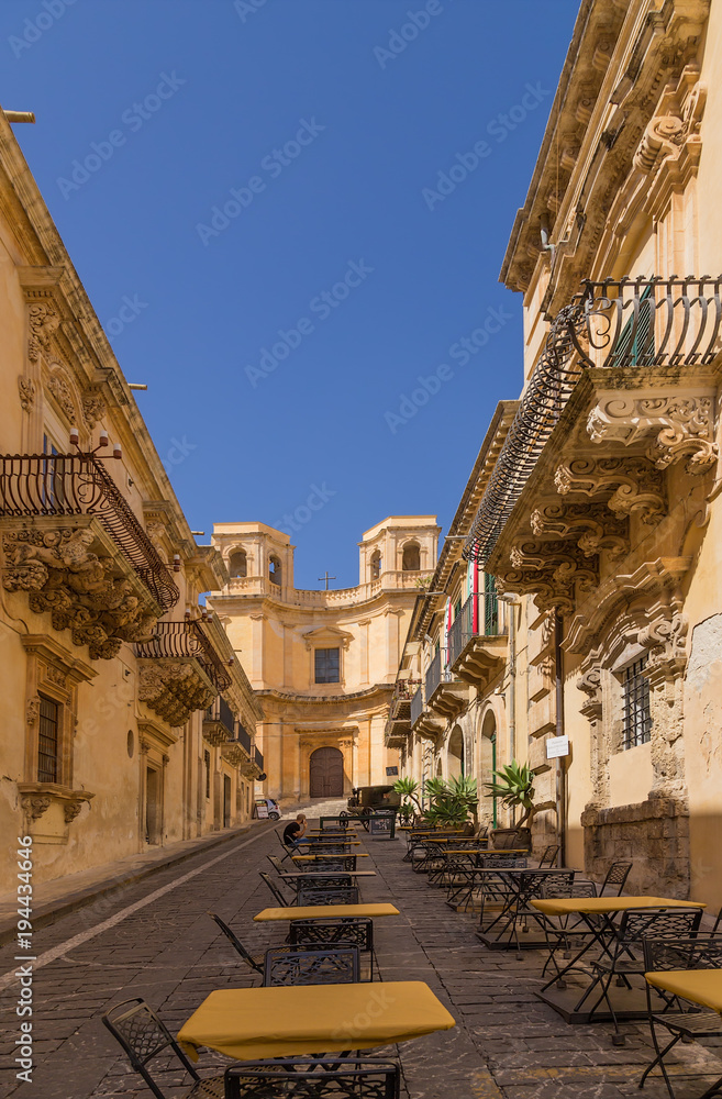 Noto, Sicily, Italy. The picturesque street Via Nicolaci, rising to the church of Montevergini, in 1748, sculptor Vincenzo Sinatra