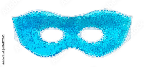 A blue beaded gel eye mask isolated on a white background.