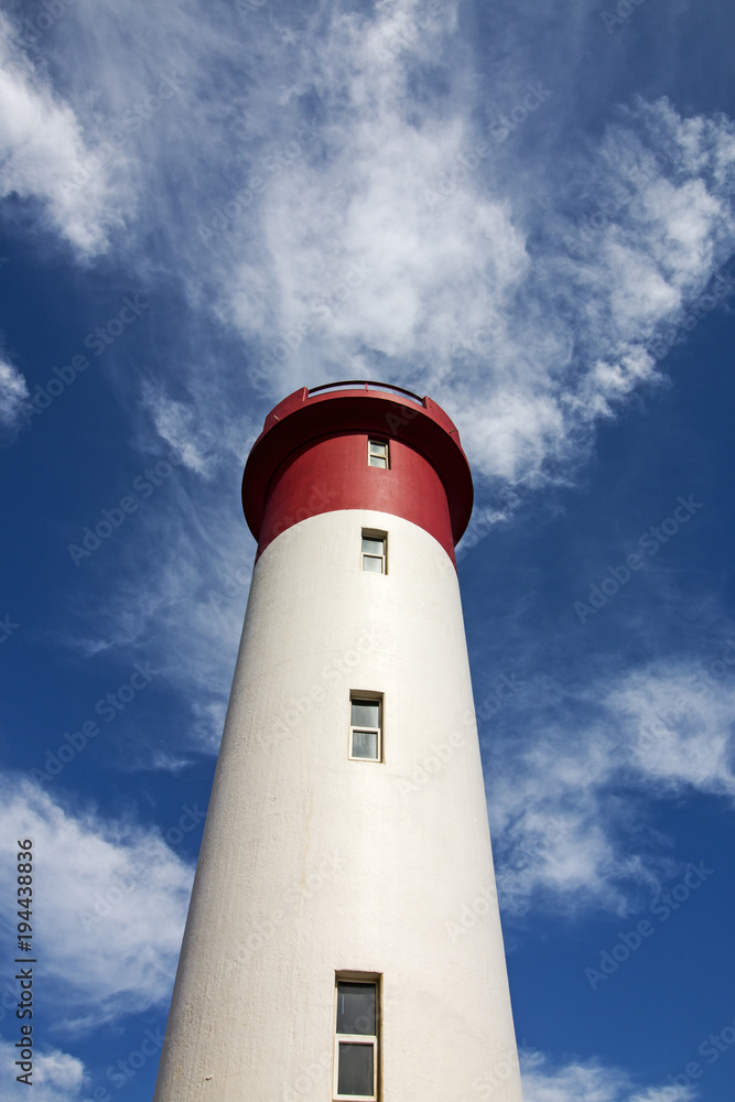  Red and White Lighthouse Extending Towards  Blue Cloudy Sky