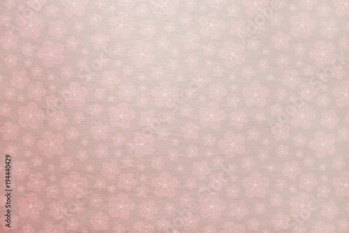 Soft pink sakura spring background with soft stone texture behind - flowers, cherry blossom