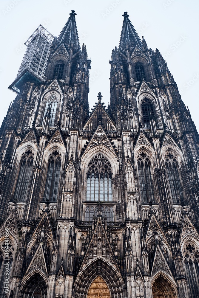 Facade of Cologne Cathedral at evening. Cologne Cathedral. World Heritage - a Roman Catholic Gothic cathedral in Cologne