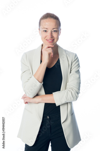 Full body portrait of casualy dressed,cheerful, beautiful, smart, young businesswoman in standing against white background. photo