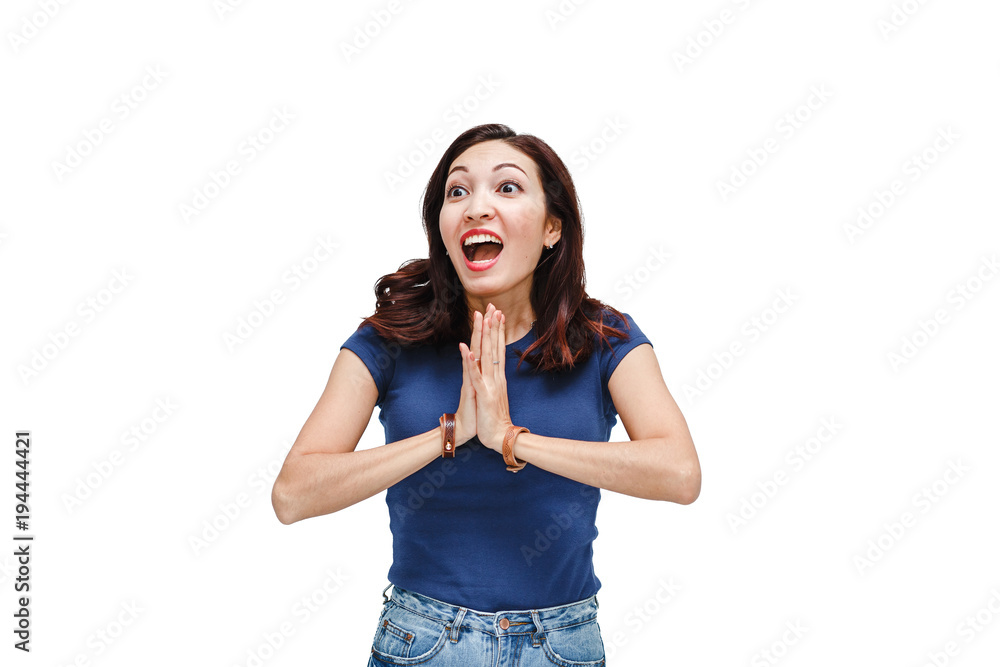 Surprised and happy young emotional woman looking excited Isolated on white background in studio Surprised and happy young emotional woman looking excited Isolated on white background in studio