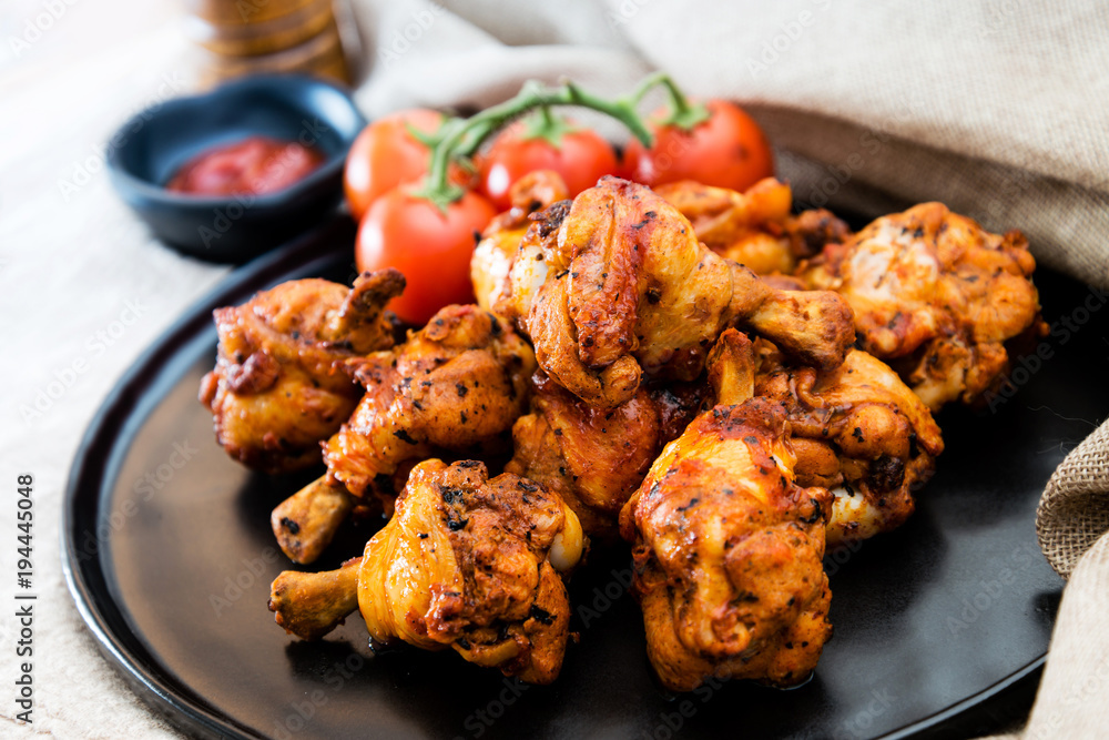 Roasted Chicken Legs BBQ With Spices, Tomato and pepper Roasted Chicken Legs BBQ With Spices, Tomato and pepper