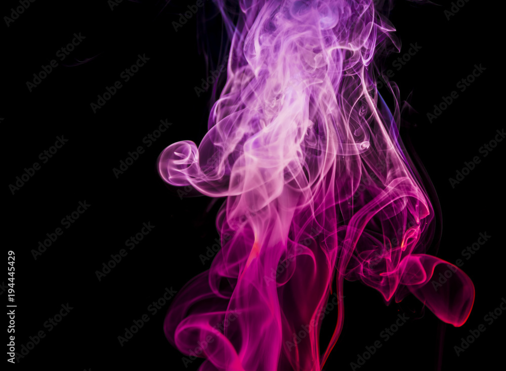 Obraz premium Colored smoke on black background