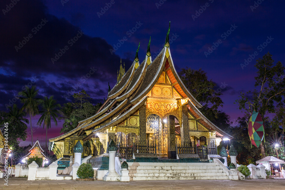 Wat Xieng Thong temple at night in Luang Prabang, Laos