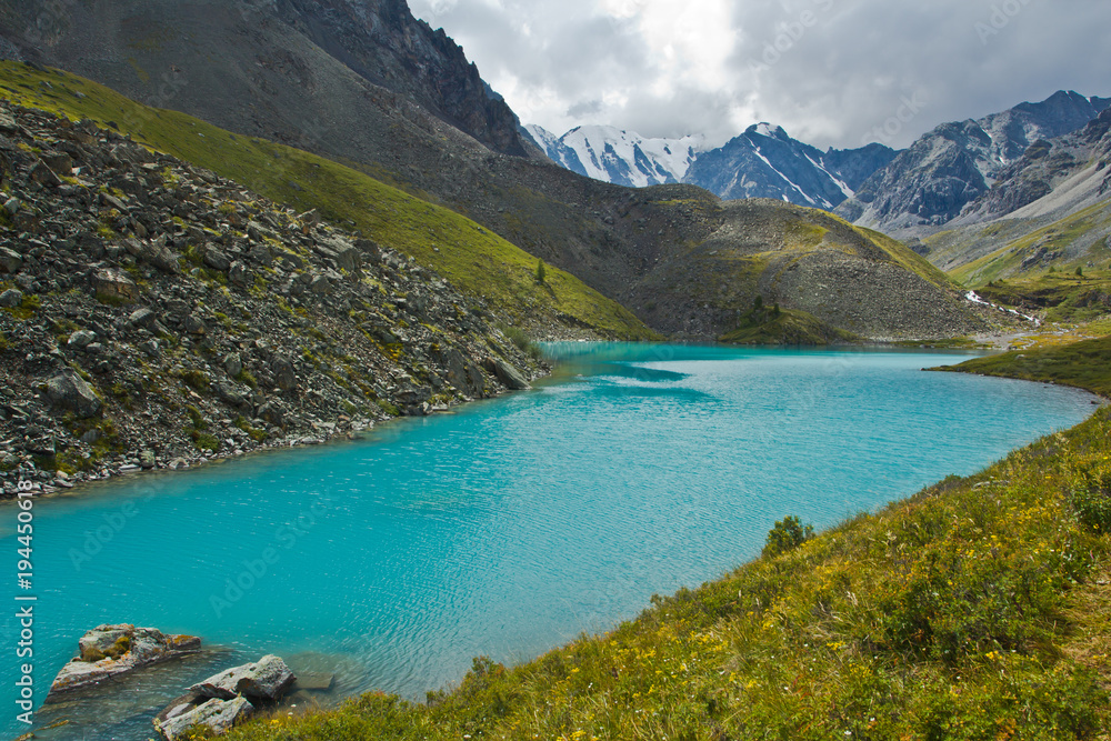 Beautifull valley with view to mountains and turquoise lake