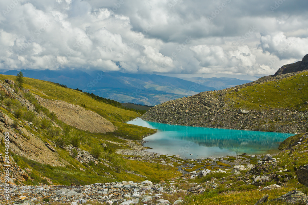 Beautifull valley with view to mountains and turquoise lake