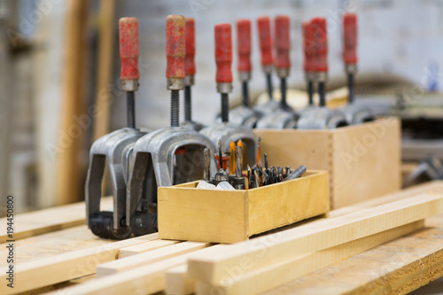 drills and woodworking tools at workshop