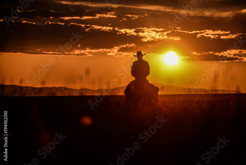 Cowboy in sunset