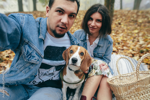Couple with dog family beagle © Victoriya Bulyha