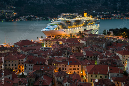 View of the old town in Kotor and a big cruise ship, Montenegro