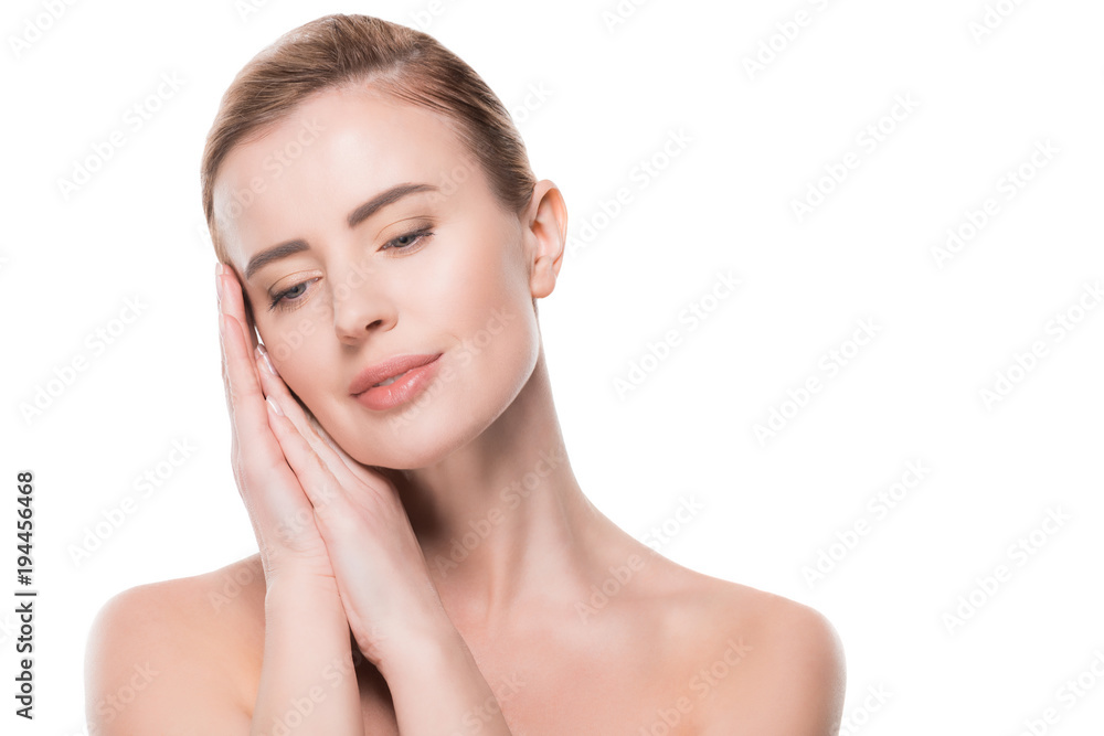 Woman with clean fresh skin touching own face isolated on white Woman with clean fresh skin touching own face isolated on white