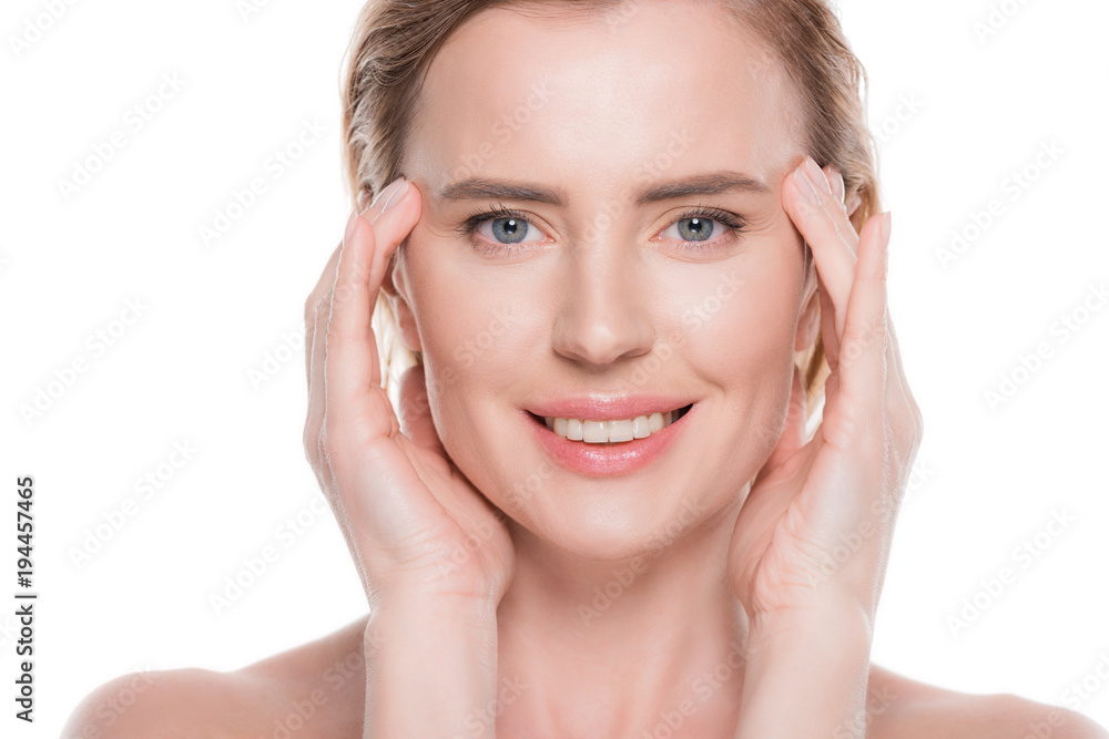 Female with clean skin touching own face isolated on white Female with clean skin touching own face isolated on white