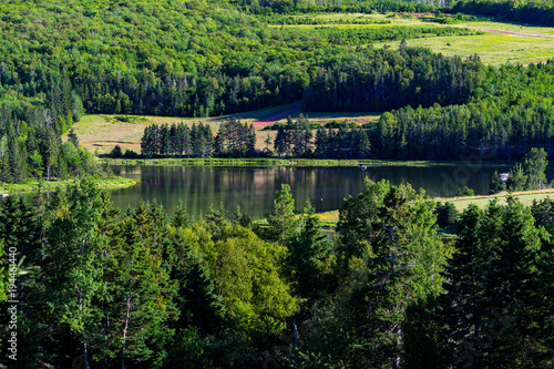 Slow river running through rural North America.