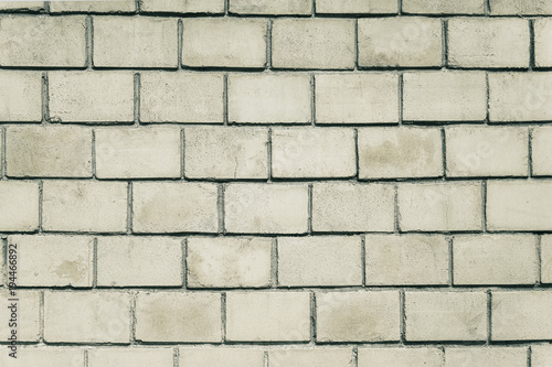 Old grey stone brick wall background