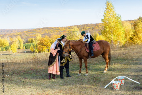 Татарские мужчина, женщина и мальчик на коне 2