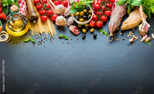 Fototapeta Naklejka Na Ścianę i Meble -  Italian Food Ingredients On Dark Table
