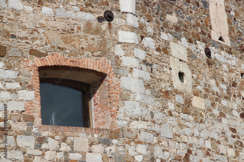 Small window in brick wall