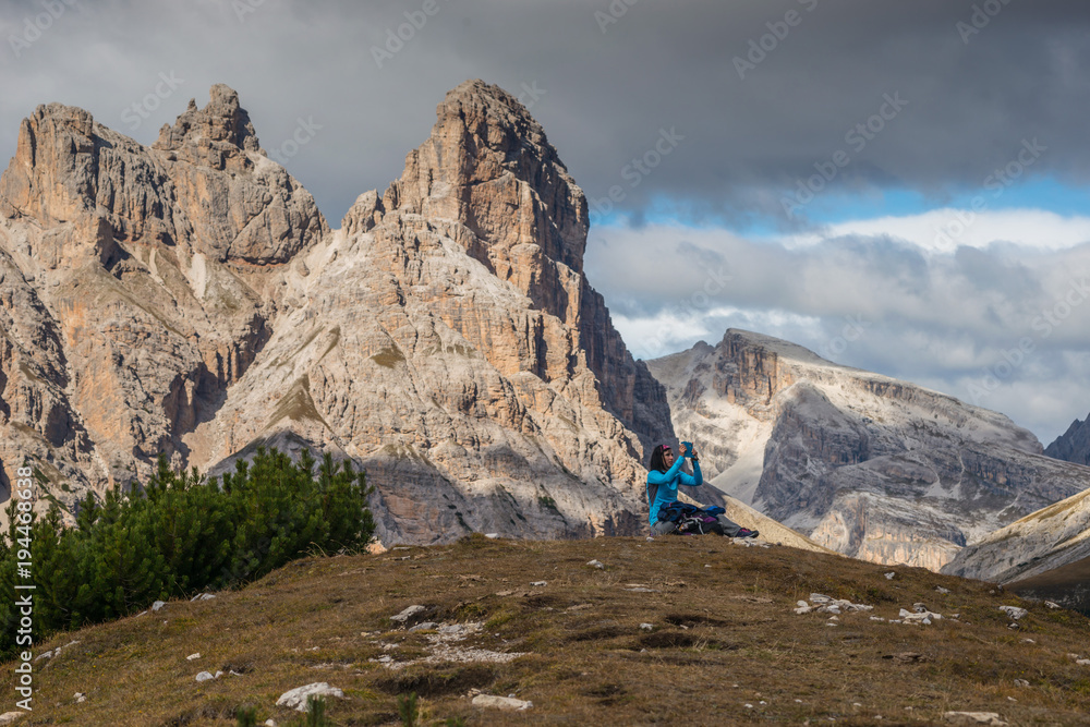 pretty young woman in italien dolomites, south tyrol, italien alps, beautiful scenery mountain