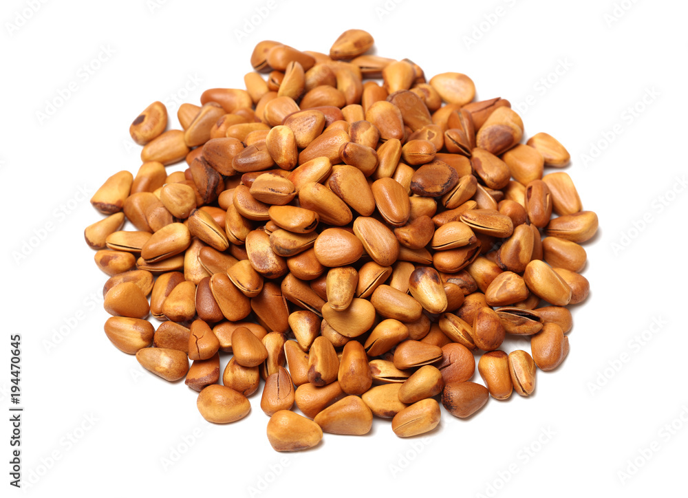 cooked pine nuts isolated on white background cooked pine nuts isolated on white background