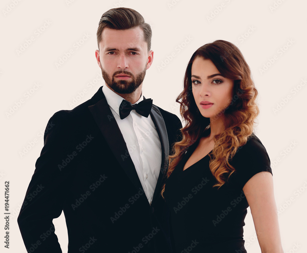 Portrait of a handsome man looking at the camera with a woman Portrait of a handsome man looking at the camera with a woman