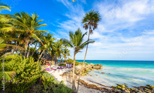 Recreation at paradise beach resort with turquoise waters of Caribbean Sea at Tulum, close to Cancun, Riviera Maya, tropical destination for vacation, Mexico