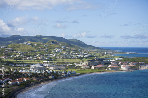 Low aerial view of resorts and beaches in St Kitts. © Wollwerth Imagery