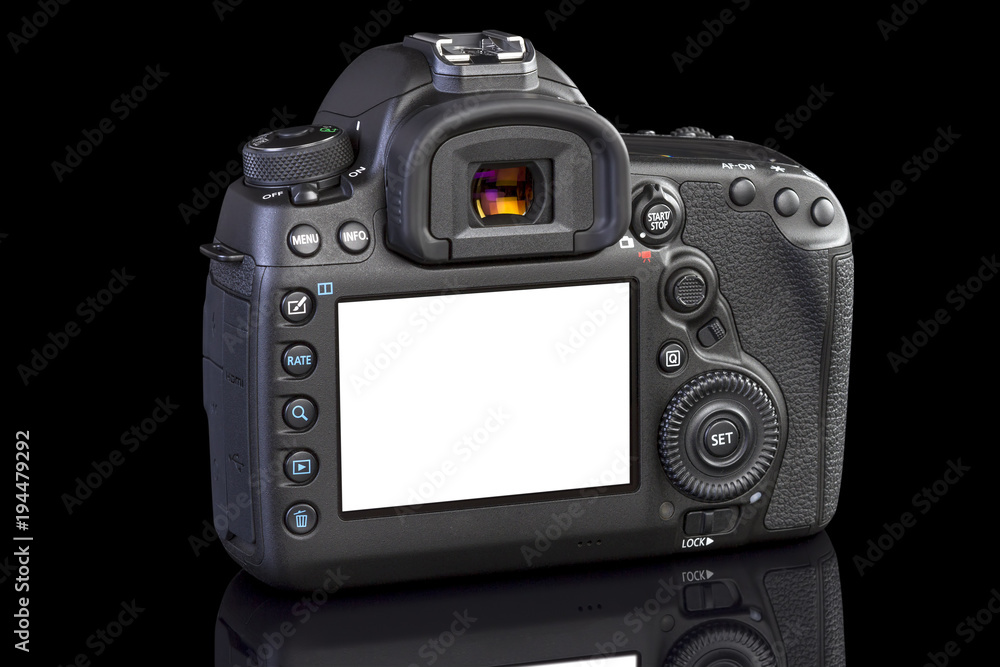 DSLR camera on black glass