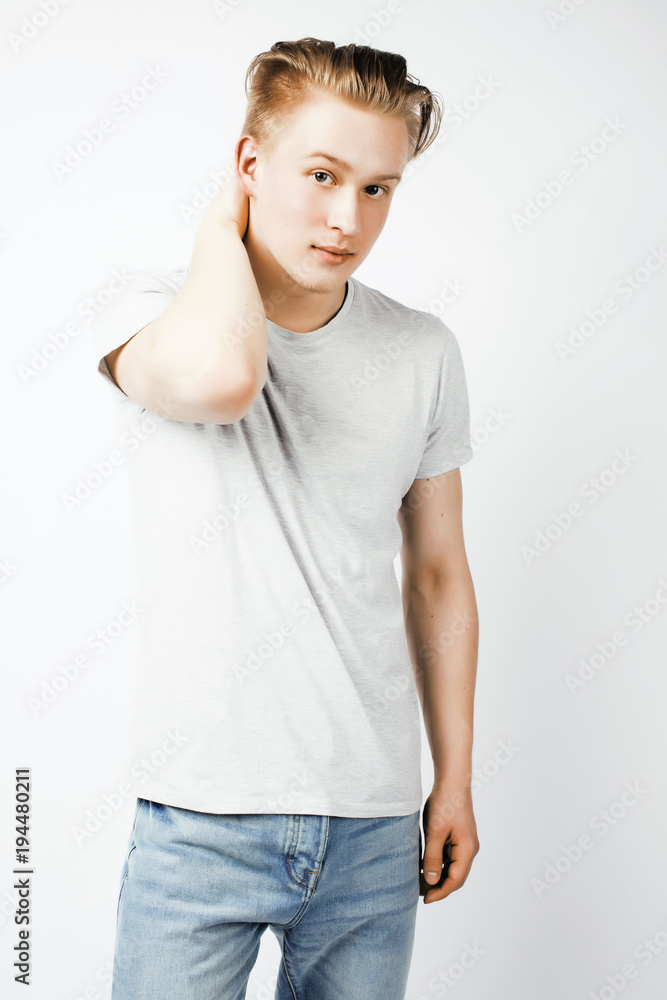 young handsome teenage hipster guy posing emotional, happy smili young handsome teenage hipster guy posing emotional, happy smili
